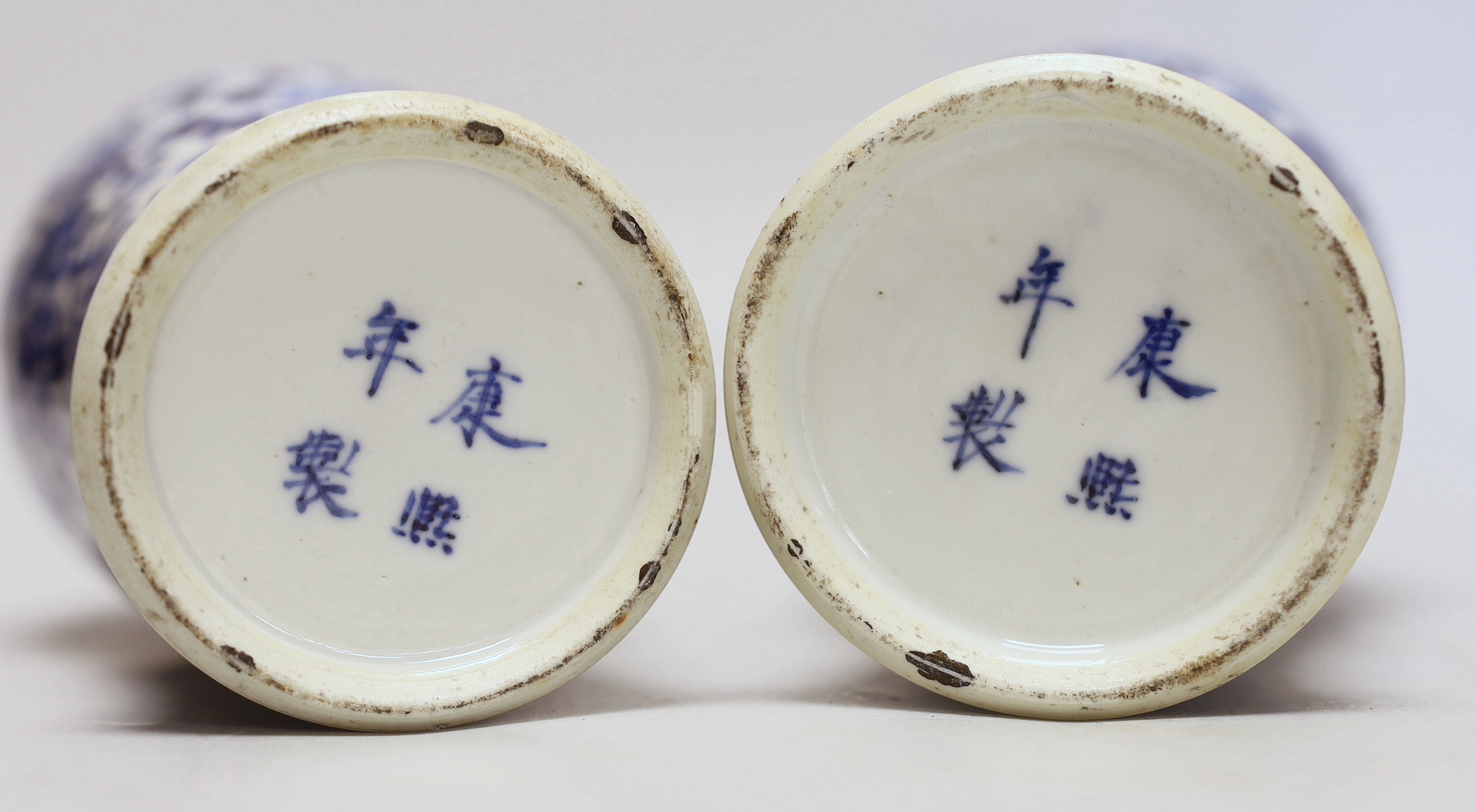 A pair of Chinese blue and white 'dragon’ vases and covers, Late 19th century, 29cm high